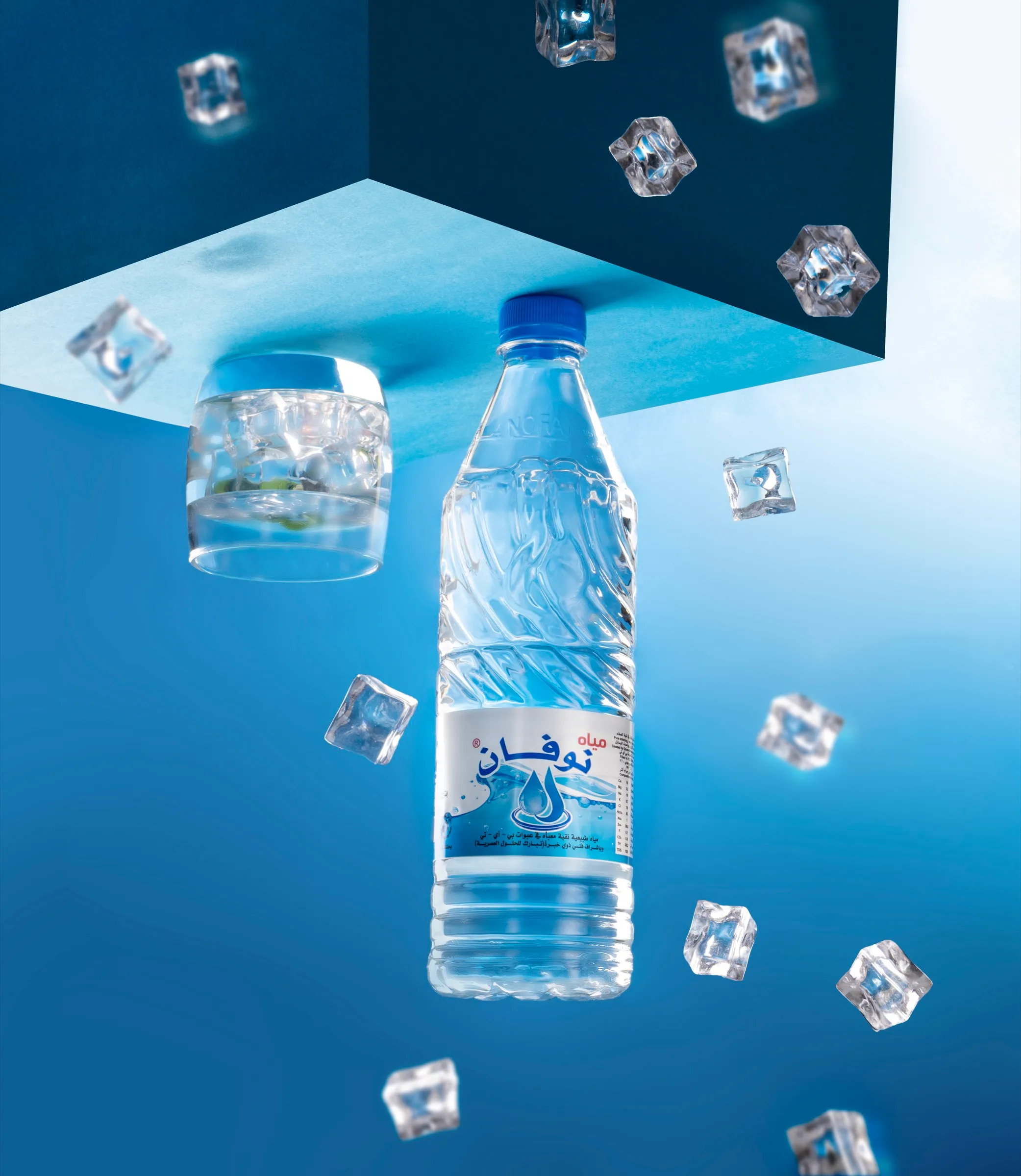 Novan bottle floating among ice cubes on deep blue